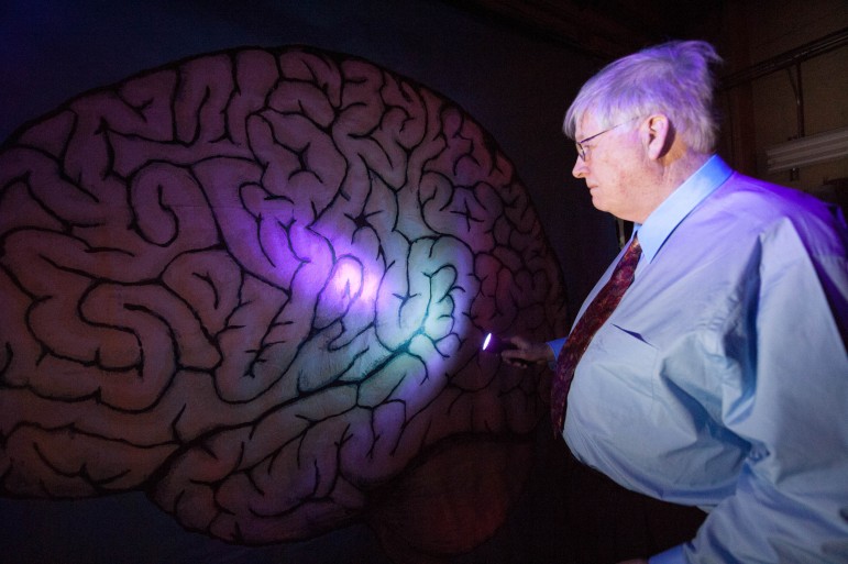 SCHENECTADY, NY - John Schenck showing how zinc atoms absorb light energy. (photo credit: Asylum Entertainment)